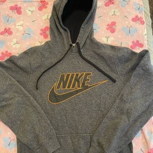 Grey, Black, & Orange Nike hoodie.